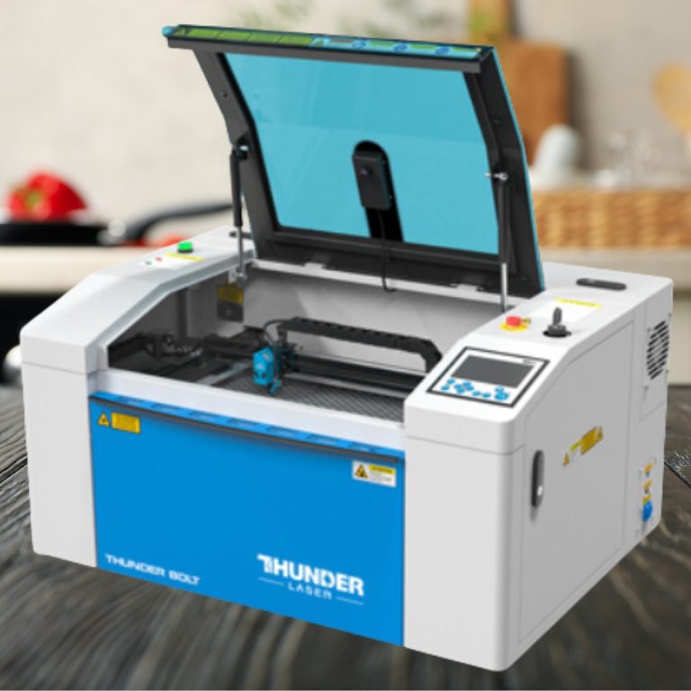 thunder bolt laser cutter bu thunder laser canada is a blue and white machine sits on a desktop