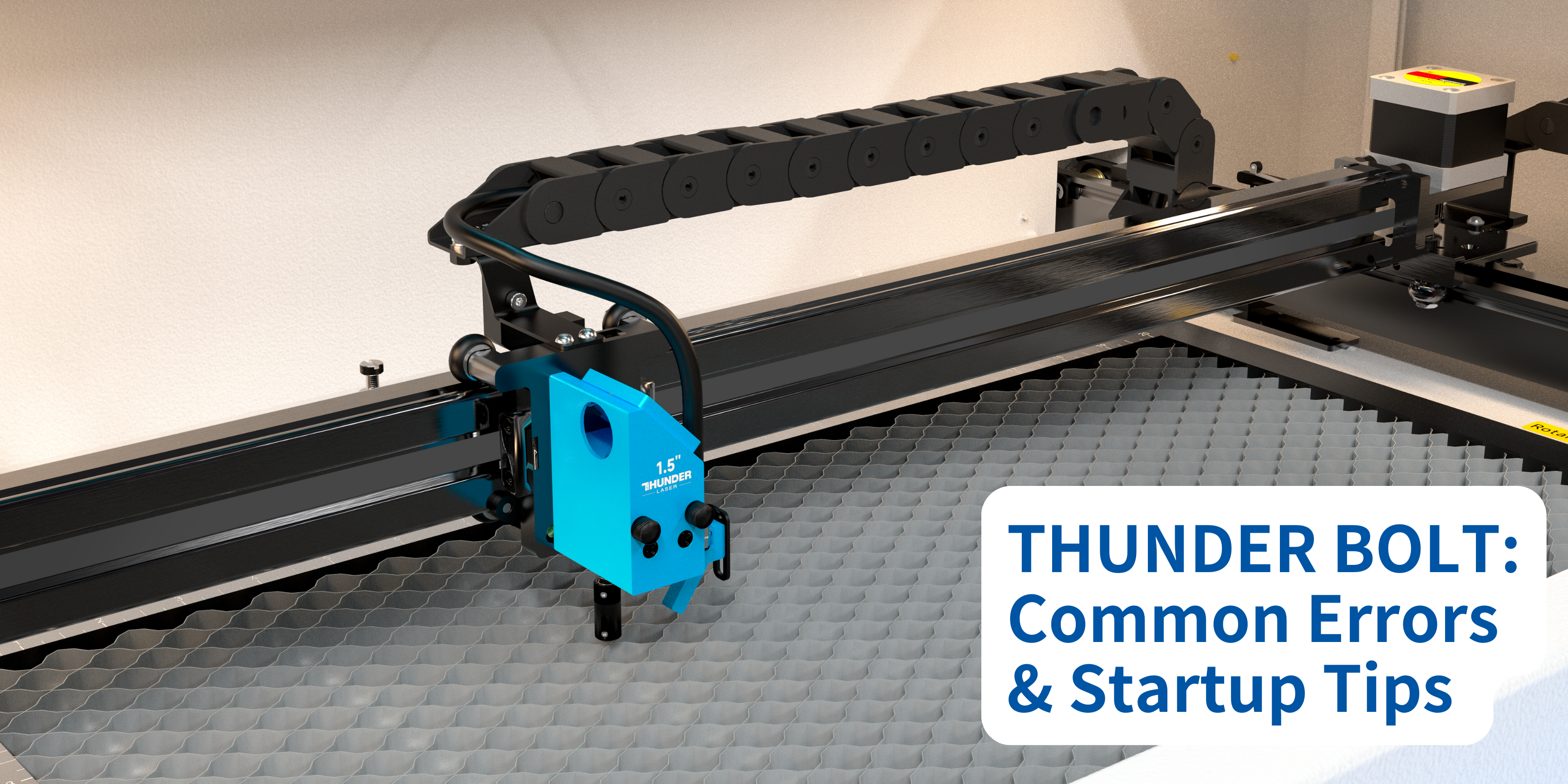 Inside the thunder bolt laser cutter by thunder laser. looking into the laser bed from above you can see a metal honeycomb bed and a laser head that is blue