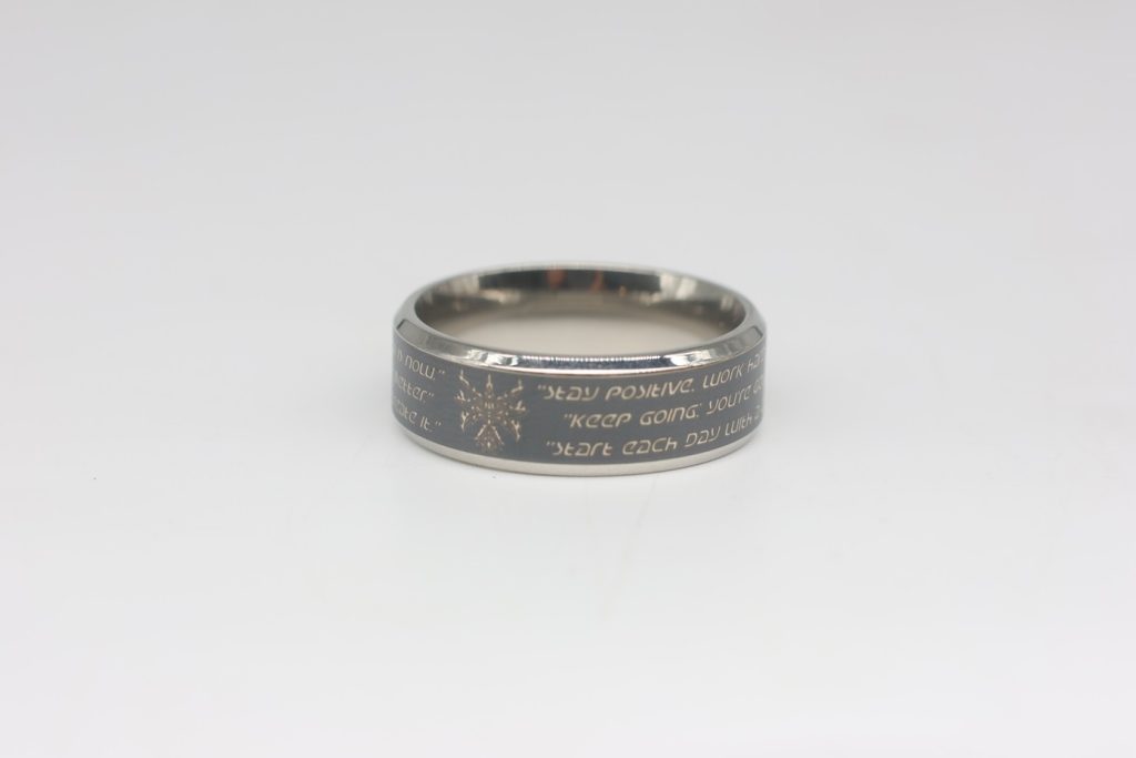 A metal ring laser engraved with a fiber laser engraver Aurora Lite by thunderlaser